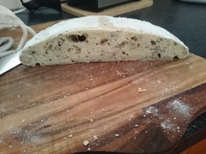 The obligatory crumb shot of my round loaf. The sandwich loaf rose a lot higher but only had little bubbles throughout it (none of the big bubbles like this).